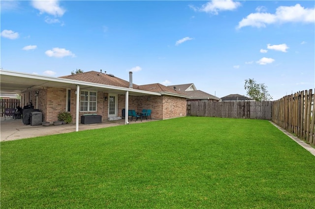 view of yard with a patio area