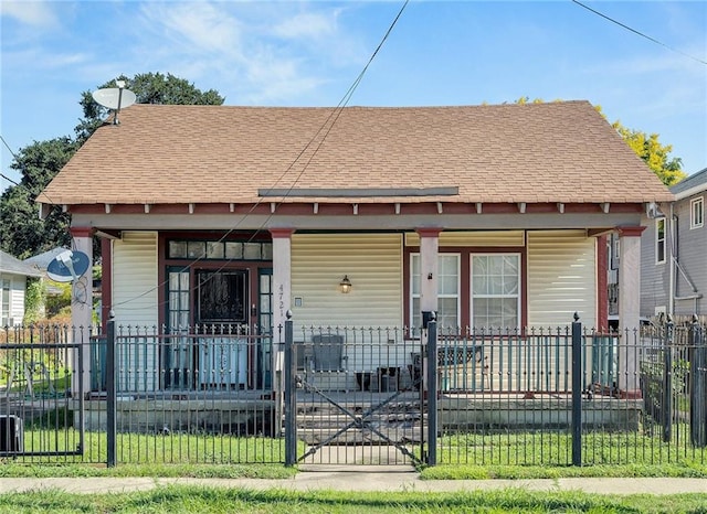 view of front of house featuring a porch and a front lawn