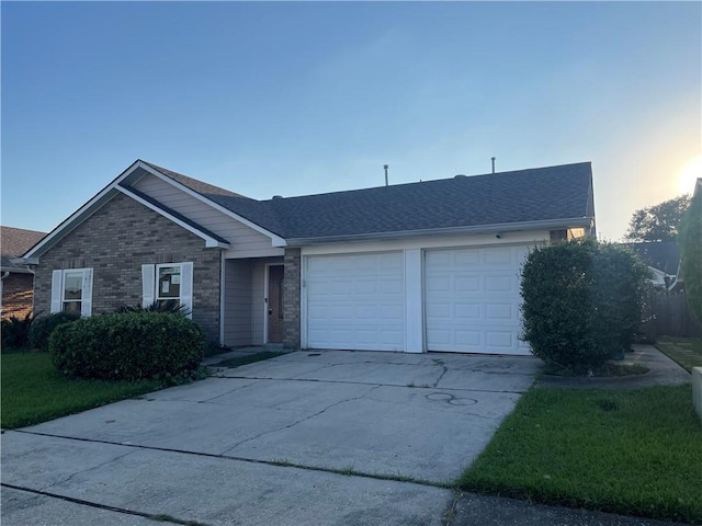 single story home with a garage