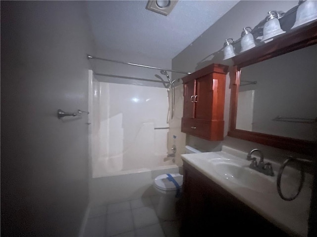 full bathroom featuring tile patterned flooring, vanity, toilet, and bathtub / shower combination