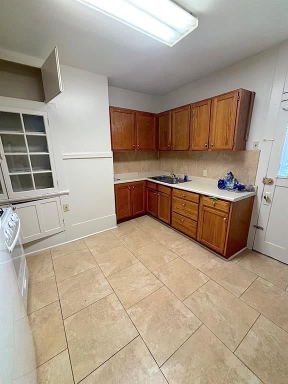 kitchen featuring sink and backsplash