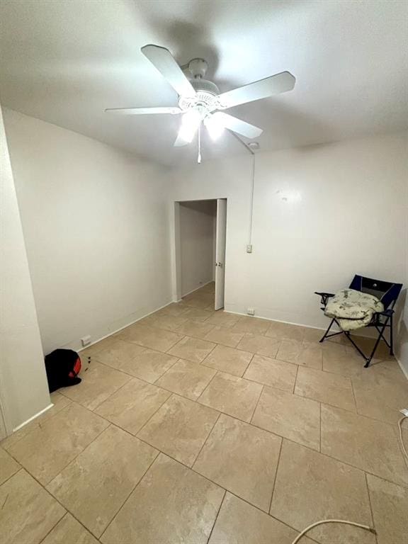 unfurnished room featuring ceiling fan