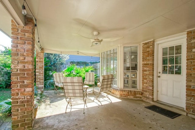 view of patio featuring ceiling fan