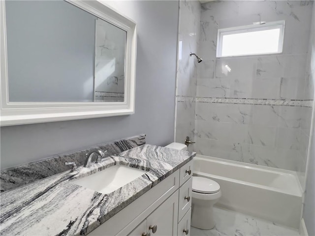 full bathroom with toilet, tiled shower / bath combo, and vanity