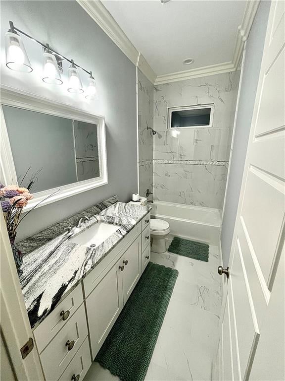 full bathroom featuring vanity, toilet, crown molding, and tiled shower / bath combo