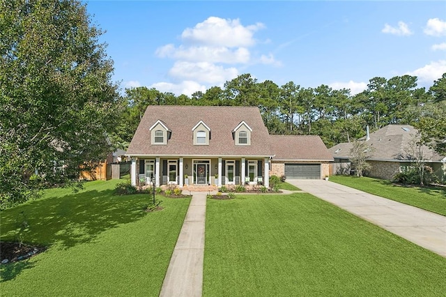 cape cod-style house with a front lawn, covered porch, and a garage