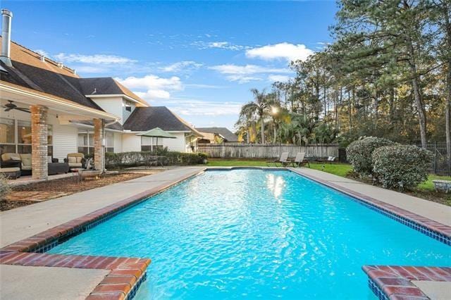 view of pool featuring a patio