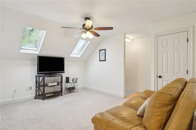 carpeted living room featuring vaulted ceiling and ceiling fan