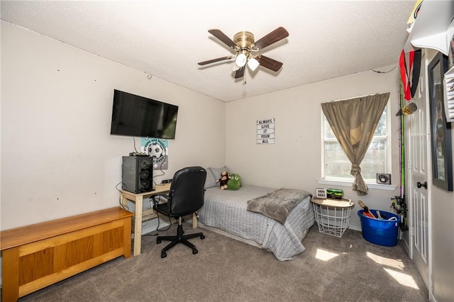 bedroom featuring carpet flooring and ceiling fan