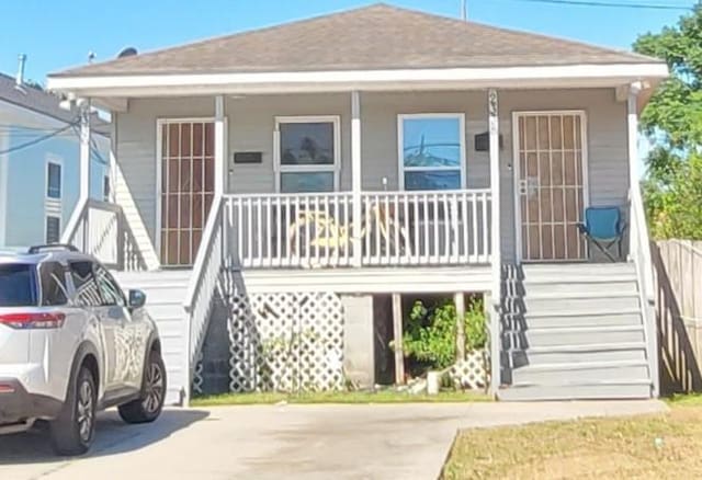 view of front of home featuring covered porch