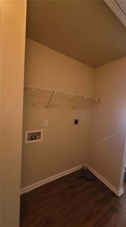 laundry area featuring washer hookup, dark hardwood / wood-style floors, and electric dryer hookup