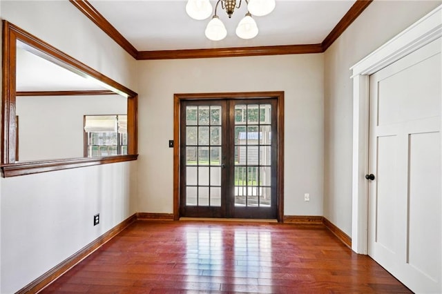 doorway with plenty of natural light, french doors, and dark hardwood / wood-style floors