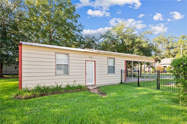 view of outdoor structure with a yard