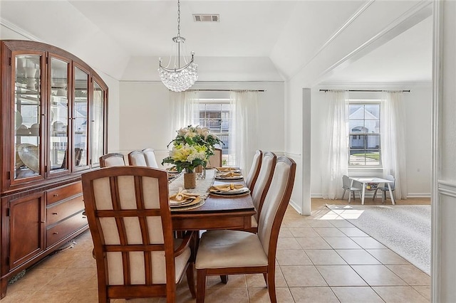 dining area with visible vents, plenty of natural light, and light tile patterned floors