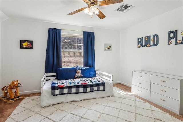 bedroom with light carpet, baseboards, visible vents, ceiling fan, and vaulted ceiling