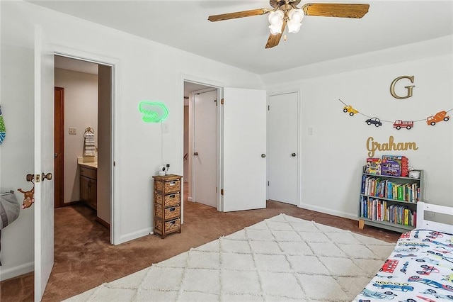 carpeted bedroom with baseboards and a ceiling fan