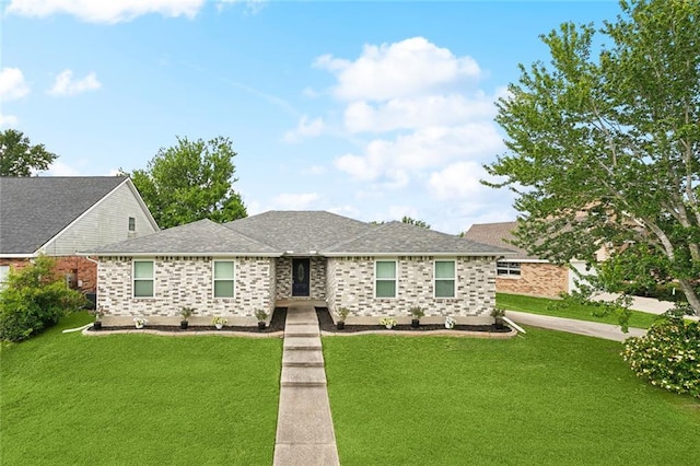 204 Chubasco Ln, Slidell, LA 70458 - ranch-style house featuring a front lawn