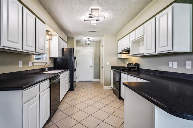 kitchen featuring a textured ceiling, sink, white cabinetry, and black appliances