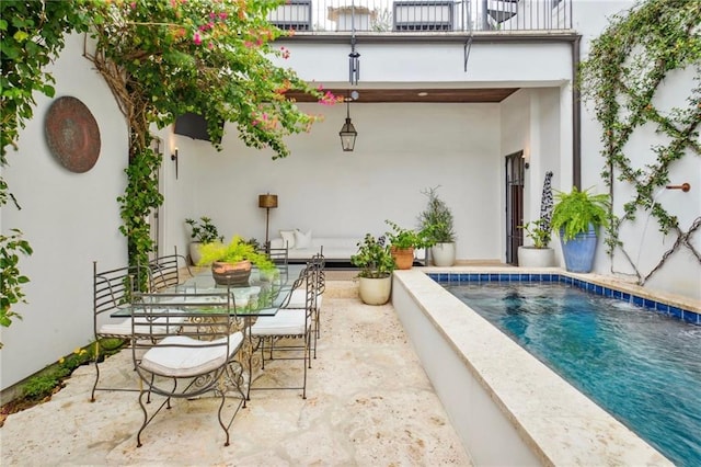 view of swimming pool featuring a patio