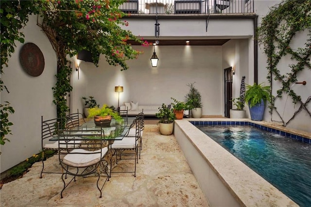 view of patio with outdoor dining area