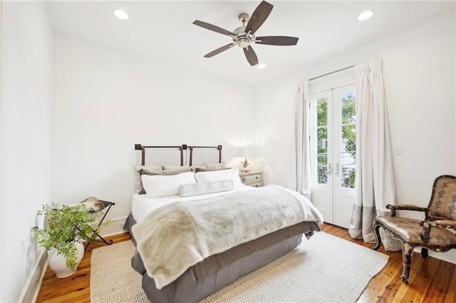 bedroom featuring light hardwood / wood-style floors and ceiling fan