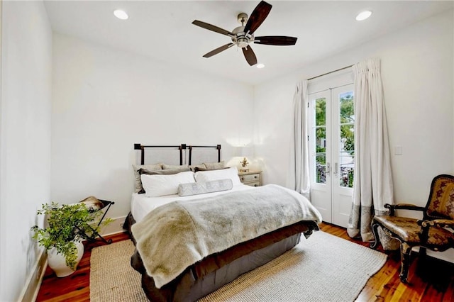 bedroom featuring recessed lighting, wood finished floors, baseboards, and ceiling fan