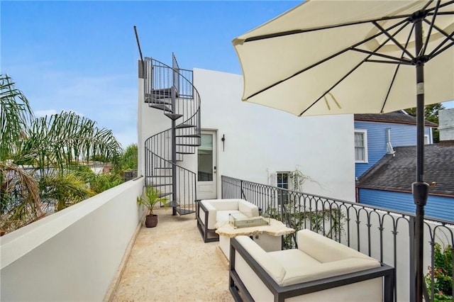 balcony with an outdoor hangout area