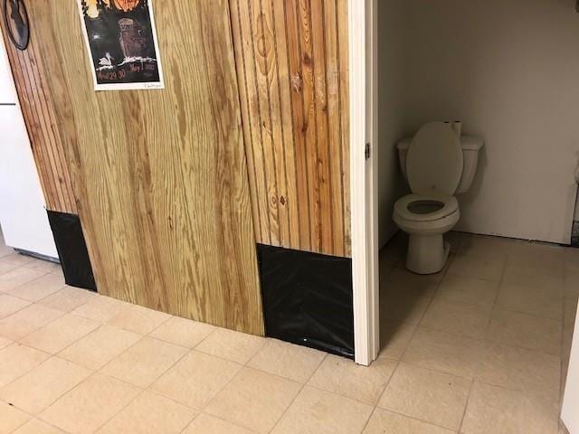 bathroom featuring tile patterned floors and toilet