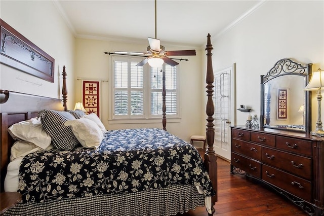 bedroom with ornamental molding, ceiling fan, and dark wood-type flooring