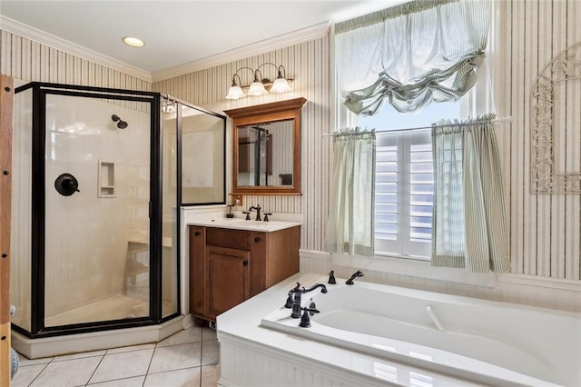 bathroom featuring vanity, shower with separate bathtub, crown molding, and tile patterned floors