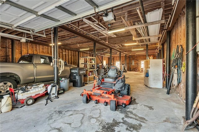 garage featuring a garage door opener