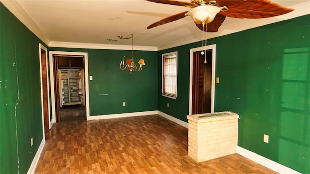 1321 Pacific Ave, New Orleans, LA 70114 - spare room featuring crown molding, wood finished floors, baseboards, and ceiling fan with notable chandelier