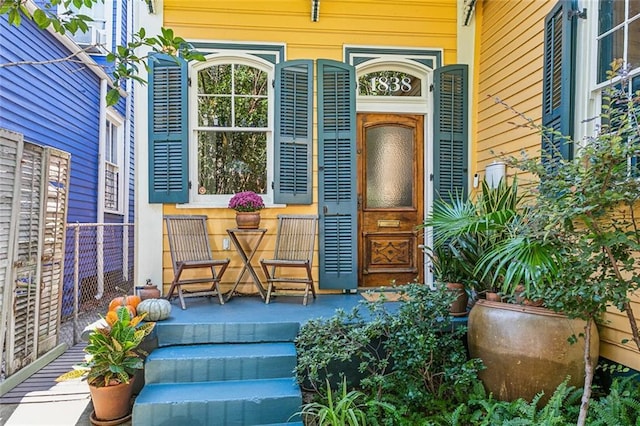 entrance to property with covered porch