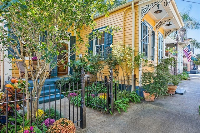 view of property exterior featuring fence