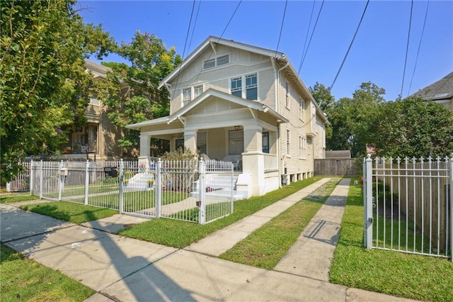 bungalow-style house featuring a front yard