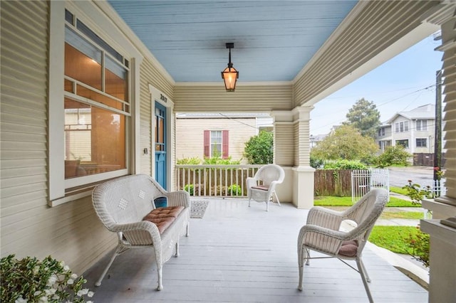 wooden terrace with covered porch