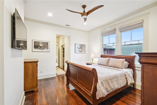 bedroom with ceiling fan and dark wood-type flooring