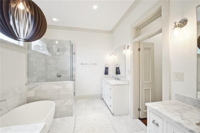 bathroom with ornamental molding, vanity, and plus walk in shower