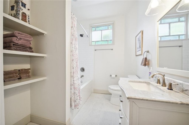 full bathroom with tile patterned flooring, shower / bathtub combination with curtain, vanity, and toilet