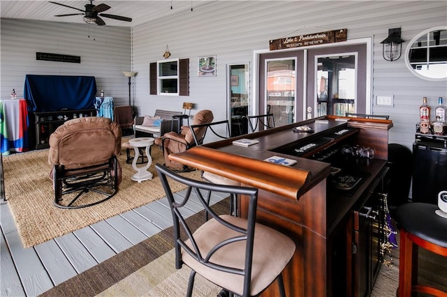 interior space featuring ceiling fan