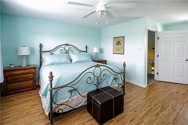 bedroom with ceiling fan and light hardwood / wood-style flooring