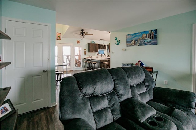 living room with french doors, dark hardwood / wood-style floors, and ceiling fan