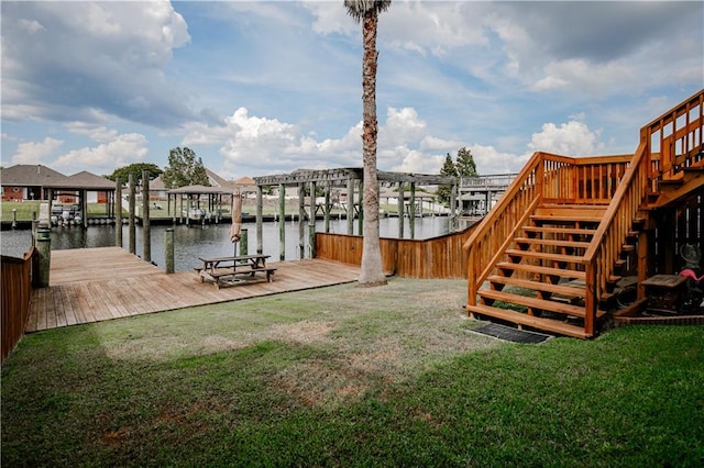 exterior space with a dock and a water view