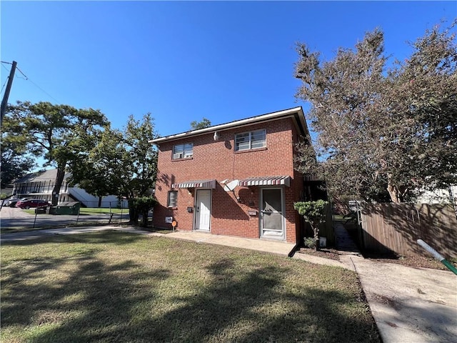 view of front of house with a front yard