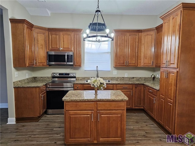 3019 Eagle St, New Orleans, LA 70118 - kitchen with stainless steel appliances, a sink, dark wood-style floors, and a chandelier