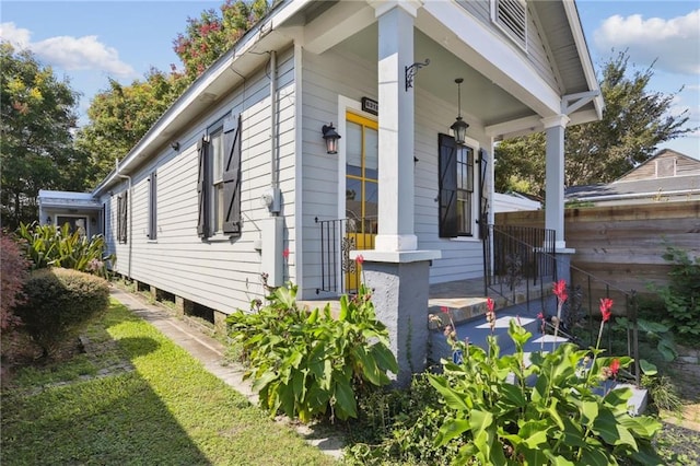 view of home's exterior with a porch