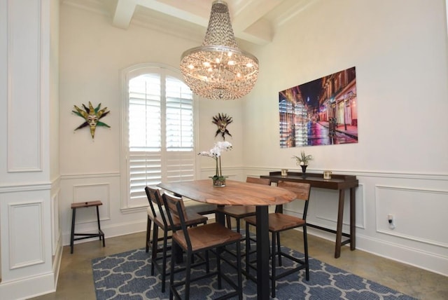 dining space featuring beamed ceiling and an inviting chandelier