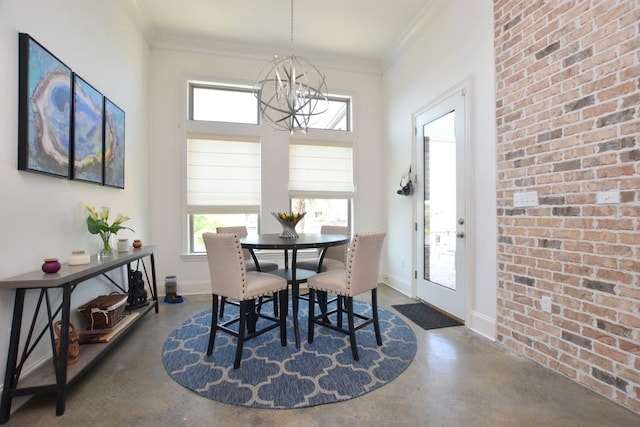 dining space with a wealth of natural light, crown molding, and an inviting chandelier