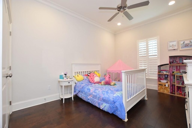 bedroom featuring dark wood-type flooring, ceiling fan, and crown molding