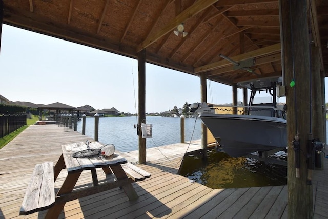 dock area with a water view